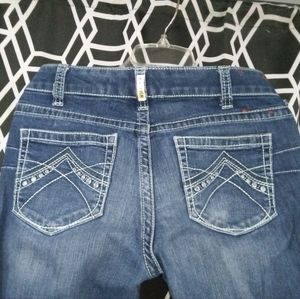 Women's size 30 Ariat jeans.